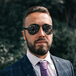 Chris Armstrong A man with a beard and a white shirt.